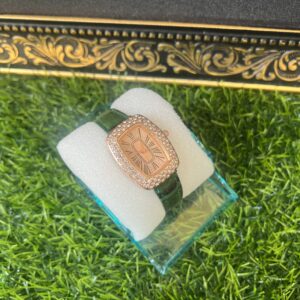 green leather wristwatch