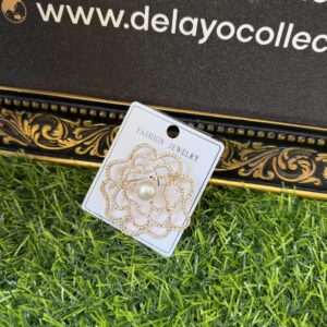 Nimi gold stoned brooch