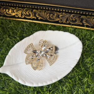 Isioma gold stoned brooch