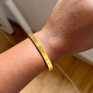 Gold Cartier stripped bangle